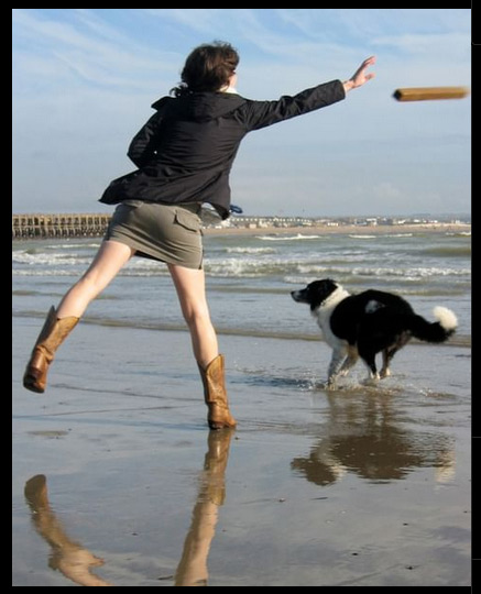 A photo of a girl throwing a stick for a dog -- which apparently goes against Instagram's 'Community Guidelines'